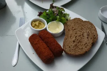 Hoe lang moet een kroket in de frituur